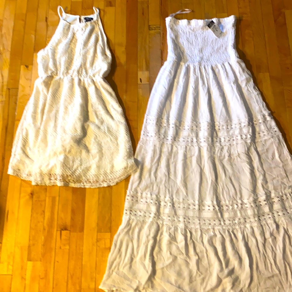 Two brand new dresses size medium